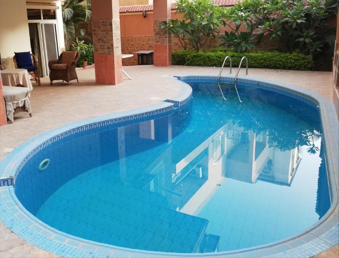 Апартаменты Hidden Gem With Pool Access In New Каир Экстерьер фото